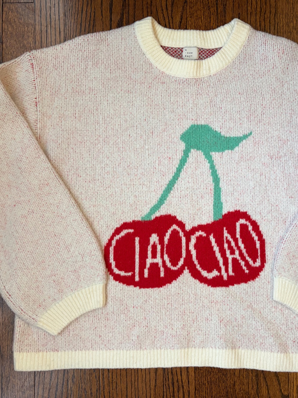Cream Cherry Graphic Sweater with Red Accent